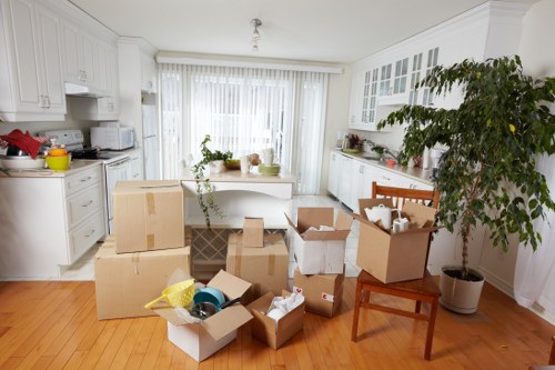Local small removals team preparing items for transport in Westgreen