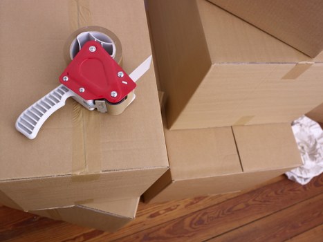 Packed moving boxes ready for house removals in Westgreen